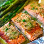 Baked Salmon in Foil with Asparagus and Garlic Butter Sauce