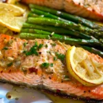 Baked Salmon in Foil with Asparagus and Garlic Butter Sauce